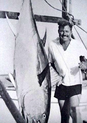 Ernest Hemingway with a blue marlin.